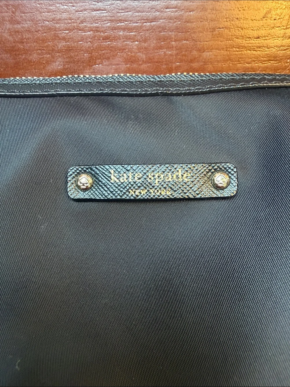 kate spade black nylon makeup bag with gold hardware